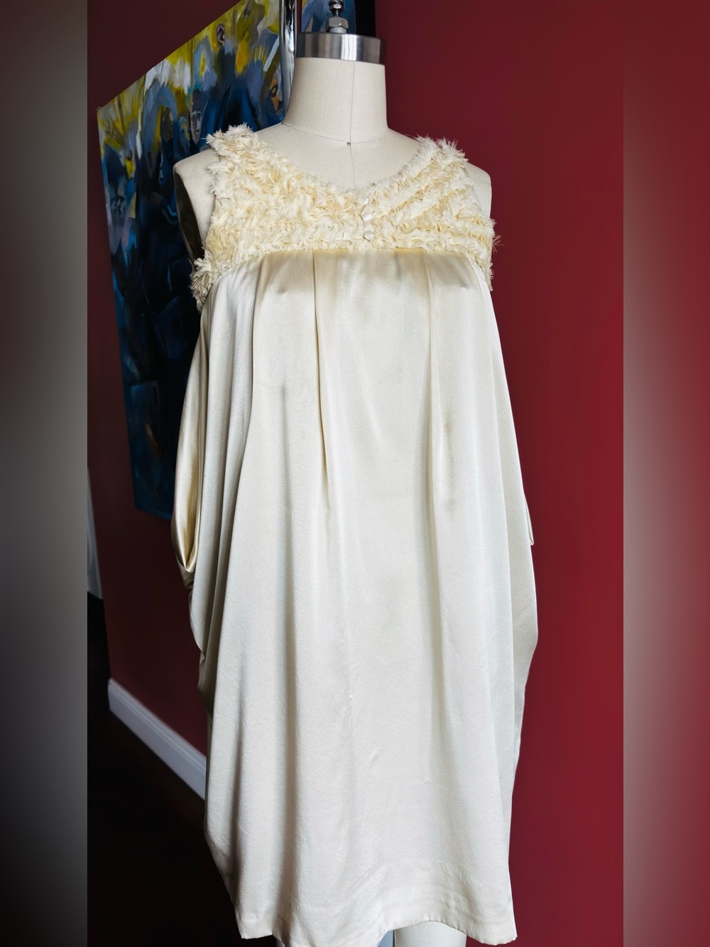 Elegant Cream Satin Formal Dress with Textured Bodice